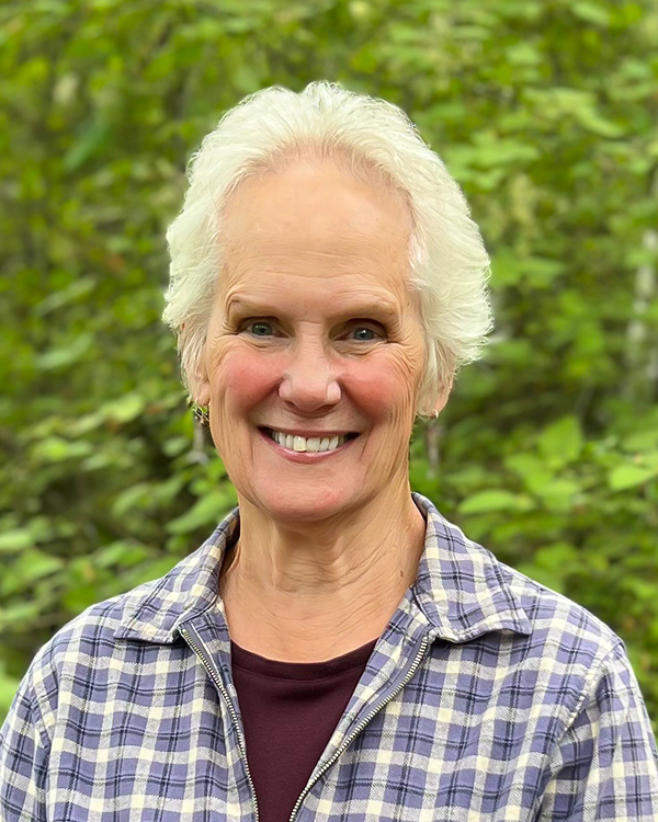 a woman, Colleen Clancy, smiling