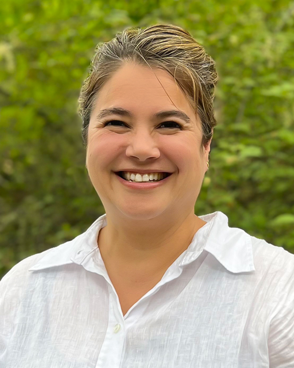 a woman, Jen Deshon, smiling