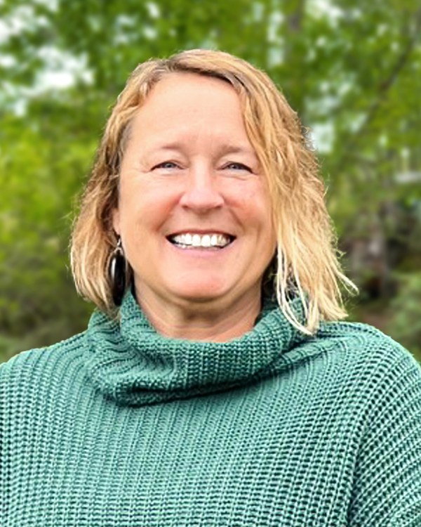 a woman, Heather Belt, smiling