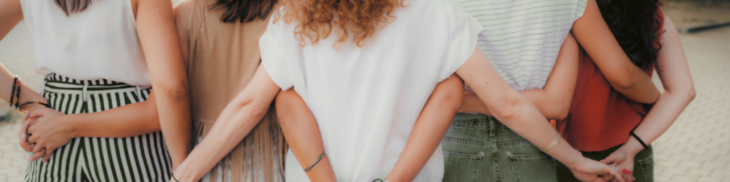 group of girls holding hands