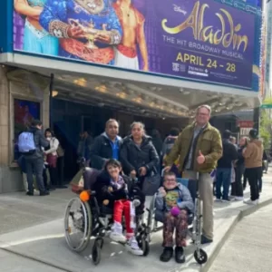 Yaas group in front of theater Aladdin show